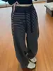 Pantalones de pierna ancha rectos con forro polar a rayas estilo europeo para mujer 2025 Otoño e Invierno Nuevos de cintura alta holgados adelgazantes de longitud hasta el suelo Modernos