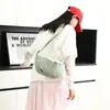 Bolsa de sela feminina transfronteiriça, bolsa transversal leve e estilosa, bolsa casual tipo bolinho para o dia a dia, bolsa de ombro sob o braço em tecido de nylon de cor sólida