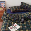 Juego de cuatro piezas de algodón lavado con gasa fruncida de cuadros simples Clase A, juego de tres piezas de gasa de doble capa a rayas de color liso estilo ins para dormitorios estudiantiles