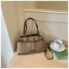 Bolsa de ombro única transversal feminina de grande capacidade, da moda, tendência, bolsa de mão simples, bolsa tipo balde de luxo leve, elegante, atacado transfronteiriço