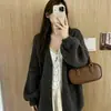 Otoño e Invierno Nuevo Estilo Coreano Estilo Perezoso Color Sólido Temperamento Chaqueta Cardigan de Punto Moda Femenina Versátil Suéter Top Tendencia