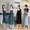 Foto Real de Falda con Tirantes de Mezclilla, Vestido de Largo Medio Adelgazante para Mujer, Estilo Casual Holgado Versátil en Negro, Azul Claro y Azul Oscuro