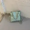 Bolso de Mano de Moda de Comercio Exterior Bolso Cubo Nuevo Primavera/Verano 2026 Bolso Versátil para Mujer Bolso Cruzado Bolso de Cadena Acolchado de Gama Alta