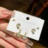 Pendientes de Planeta Luna Nuevos Compactos Micro-pavimentados de Zirconia Estilo Ins Nicho Diseño Simple Versátil Pendientes de Gama Alta