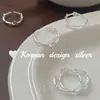 Popular joyería de plata brillante de Dongdaemun, Corea del Sur: Anillo de plata de ley S925 hueco de luna y estrella, pequeño y lindo, adecuado para apilar