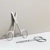 Al por mayor en stock Tijeras Redondas para Vello Nasal de Uso Doméstico Herramientas de Maquillaje Pegatinas para Doble Párpado Tijeras Pequeñas Especiales Tijeras de Maquillaje de Acero Inoxidable