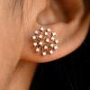 Cao Shi desea nuevos aretes de oro rosa aretes florales de estrella multicapa aretes retro franceses para mujer estilo Hong Kong