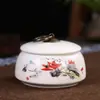 Exquisitas Latas de Té de Cerámica Dehua Latas Pequeñas Auspiciosas Dingyao Latas Selladas Blancas Mate Latas para Viaje a Granel