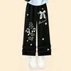 Conjunto de Dos Piezas para Niña de Verano: Top de Manga Corta con Letras Estilo Universitario, Encaje de Moda con Lazo, Pantalones Largos Casuales de Pierna Ancha