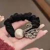 Explosiones de Moda Cisne Flash Diamante Anillo Intestino Delgado Negro Sentido de Alta Calidad Cuerda para Cabeza Cola de Caballo Elegante Cuerda para Cabello de Bola Todoterreno