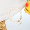 Pulseira de pérolas de água doce natural Coreia do Sul estilo ins suave joia de mão simples rabo de peixe de pérola pulseira de menina atacado