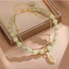 Pulsera de lujo ligero pluma de invierno verde tres nacimientos pulsera de albaricoque venta al por mayor regalo de cumpleaños para mujer aniversario de boda pareja enviar boudoir