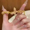 Pulsera Envolvente de Mariposa Dorada y Rosa de Alta Gama Modelo Nuevo 2025 Pulsera de Diseño de Nicho de Lujo Ligero Joyería Regalo para Novia