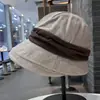 Nuevo sombrero de cubo cálido de lana versátil y elegante para otoño e invierno, estilo retro coreano, adelgazante, con ala enrollada, sombrero de pescador plegable