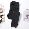 Jeans Negros y Grises de Borde Crudo para Mujer Primavera 2025 Nuevo Estilo Coreano de Nueve Puntos Cintura Alta Efecto Adelgazante Ajustados Pantalones de Pierna Pequeña de Celebridad de Internet