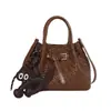 Mini bolso tipo cubo tejido con patrón francés transfronterizo con diseño de hebilla de cinturón, bolso de mano de nicho, bolso cruzado, bolso de mano para el día a día