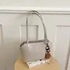 Bolso de axila retro de alta gama para mujer, nuevo bolso de hombro tipo cubo versátil de moda de verano para el día a día