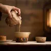 Juego de Té Portátil Copa Voladora del Ciervo de Nueve Colores de Dunhuang: Una tetera y tres tazas para té, perfectas para viajar y acampar al aire libre