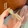Pulseira de Prata Pura 999.9 Fusheng com Padrão de Grama Tang e Borboleta para Mulheres com Esmalte Dourado Sólido Aberta Estilo Chinês Pulseira de Prata Pura