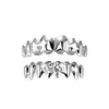 Amazon Europeo y Americano Ocho Dientes Chapados en Oro Brillantes Forma de Estrella Brackets Colmillos de Vampiro Personalizados Pequeños Dientes de Tigre Versátiles Accesorios Dentales