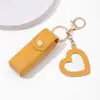 Lindo Porta-Labial Mini con Espejo, Billetera Portátil con Llavero, Bolsa para Guardar Labiales sobre Rojo, Bolsita de Regalo de Moda para Mujeres