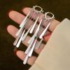 Aretes Elegantes Franceses de Borla de Lentejuelas Largos con Hebilla para la Oreja Aretes Únicos de Alta Gama Estilo Frío Aretes de Celebridad de Internet