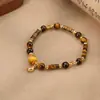 Joyería al por mayor: lapis lázuli natural, pulseras de perlas de lujo ligero de nicho, accesorios versátiles para niñas, joyería simple de alta gama
