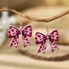 Pendientes acrílicos versátiles y elegantes estilo universitario con lazo para mujer, pendientes de lápiz de nicho para temporada de graduación, lindos y modernos