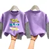 Camiseta de manga larga para niño 2026 nueva ropa de otoño para niños, camiseta básica de algodón puro de imitación de dos piezas para niño, top para niños mayores