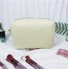 Etsy más vendido bolsa de cosméticos de seersucker a rayas bordada para viaje almacenamiento portátil de artículos de aseo bolsa de cosméticos
