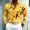 Nueva camisa de manga larga para hombre con base azul y estampado de salpicaduras naranja-amarillas, diseño audaz y llamativo, versátil para ir al trabajo
