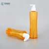 Botella con Bomba de Presión de 270ml, Botella con Forma de Cintura para Aceite Limpiador, Botella Limpiadora Cosmética para Mascotas, Botella Vacía de Plástico Amarillo Translúcido