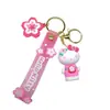 Lindo Dibujo Animado Flor de Cerezo Sanrio Llavero Flor de Cerezo Kloomi Perro Orejón Grande Muñeco Colgante Máquina de Garra Regalo