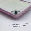 Fornecimento do Fabricante Prata S925 Banhado a Platina Cravejado Anel Azul Londres Moda Feminina Anel Girassol Fosco Bracelete