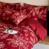 Juego de cuatro piezas de jacquard de doble capa de gasa teñido en hilo de algodón de alta gama para boda en rojo, sábana y funda de edredón de algodón puro, ropa de cama para boda