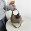 Bolso tipo cubo de nicho de alta gama para mujer, nuevo bolso de hombro con cadena de moda 2026, bolso cruzado versátil