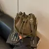 Nuevo bolso tipo cubo transfronterizo para mujer, bolso de mano versátil de moda otoño 2026, bolso de hombro, bolso cruzado simple para el día a día