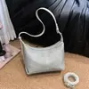 Bolso cruzado de nicho retro estilo coreano transfronterizo para mujer, verano 2026, textura de cuero suave, bolso de hombro casual para el día a día