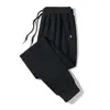 Pantalones de terciopelo al por mayor directos pantalones casuales para hombre otoño e invierno punta deportiva cremallera ropa exterior deportiva pantalones cálidos