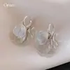 Pendientes de Borla con Forma de Pétalo de Flor Hueca Transfronterizos Europeos y Americanos, Pinzas para Orejas con Diseño de Moda de Nicho, Pendientes de Lujo Ligero de Gama Alta al por Mayor