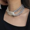 Collar apilado con combinación de colores de perlas exageradas para mujer, otoño e invierno, nuevo, cadena de suéter elegante retro multicapa, cadena de clavícula de alta calidad