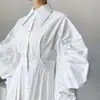 Enviado. Nueva colección de otoño de Dongdaemun, Corea: vestido de manga abullonada plisada de nicho con cinturón para mujer