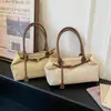 Bolsa de mano casual tejida de paja para mujer, nueva moda 2026 diseño calado, gran capacidad, bolso de axila de verano
