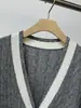 BORBOTIE Ropa de punto para mujer 2026 Primavera y Otoño Nuevo BC Lana de Cachemir Tejido de punto de ochos Bolsillo de color contrastante Cardigan con cuello en V