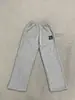 Pantalones Deportivos de Felpa con Cintura de Cordón para Primavera y Otoño, Estilo Retro Americano con Bolsillos de Parche de Bandera, Pantalones Deportivos Unisex de Corteholgado al por Mayor