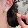 Agita el sonido de los pendientes de flor de hortensia del mismo estilo para mujer, aguja de plata 925, diseño de nicho, pendientes versátiles de temperamento de alta gama