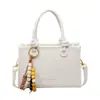 Moda Transfronteriza Versátil Bolso Pequeño Cuadrado 2026 Modelo Nuevo Bolso Cruzado de Mano Textura de Alta Calidad Exquisito Elegante Retro Bolso Pequeño