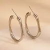 Pendientes de moda transfronterizos de aguja de plata, flor de rama redonda hueca, pendientes de metal de moda, pendientes de alta gama europeos y americanos