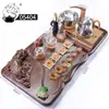 Bandeja de té para el hogar Mesa de té de madera Juego de Mar de Té grande de una sola pieza cuatro en uno soporte para estufa eléctrica automática generación