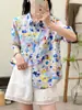 Camisa de Verano 2026 Estilo Japonés Dulce Estampado de Dibujos Animados Cuello Solapa Manga Corta para Mujer, Top Holgado y Adelgazante, Venta al por Mayor